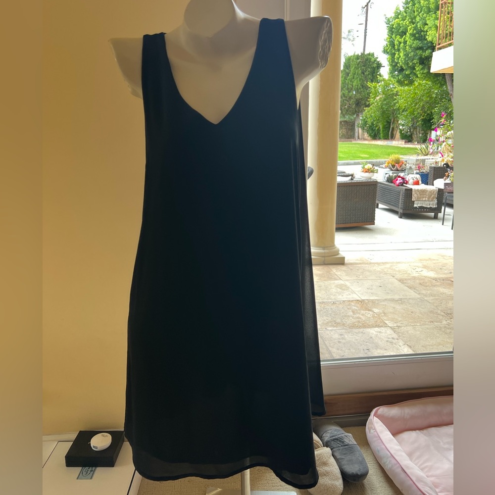 Cape sleeveless dress